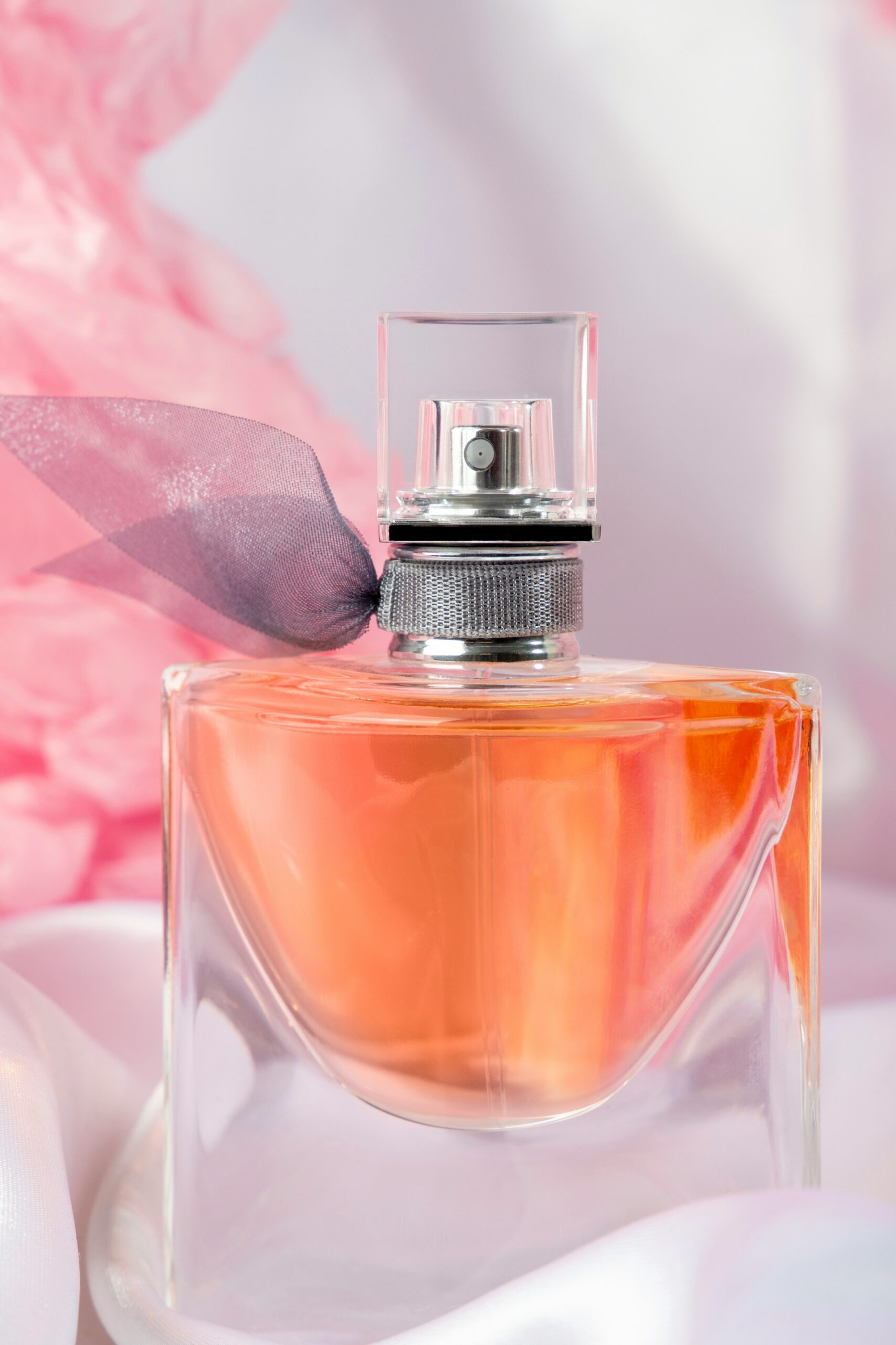 Heart-shaped pink perfume bottle
