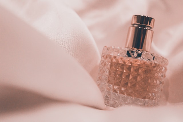 Textured glass fragrance bottle close-up